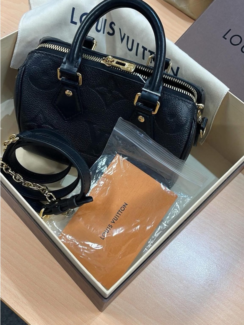 Louis Vuitton Black Embossed Leather Satchel with Gold Hardware